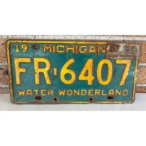Vtg 1959 Michigan License Plate Tag Man cave ford Chevy Garage w/61 tag FR6407